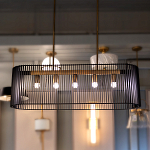 Люстра подвесная овальной формы с металлическим решетчатым абажуром матово-черного цвета и 5 лампами Kichler варинант исполнения - 7 | Loft Concept в Тюмени