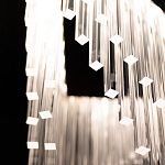 Люстра золотого цвета в форме галочки с каскадом длинных прозрачных трубок Eurofase варинант исполнения - 11 | Loft Concept в Тюмени